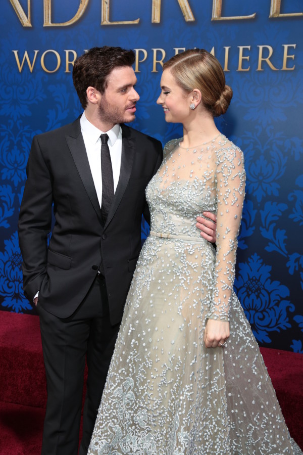 Lily James and Richard Madden arrive as Disney Pictures presents the world premiere of "Cinderella" at the El Capitan Theatre in Los Angeles, California on Sunday, March 1, 2015. .(Photo: Alex J. Berliner/ ABImages)